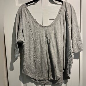 Fabletics top with wide scoop v neck and curved hem